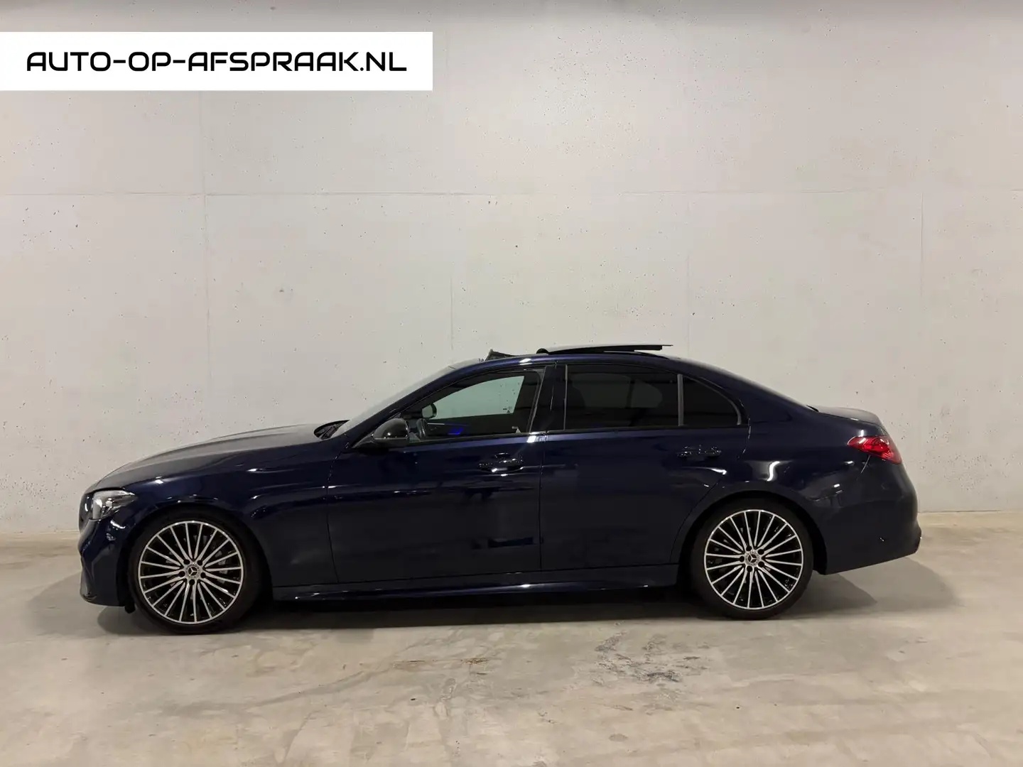 Mercedes-Benz C 180 AMG Pano Garantie 11-2026 Blauw - 1