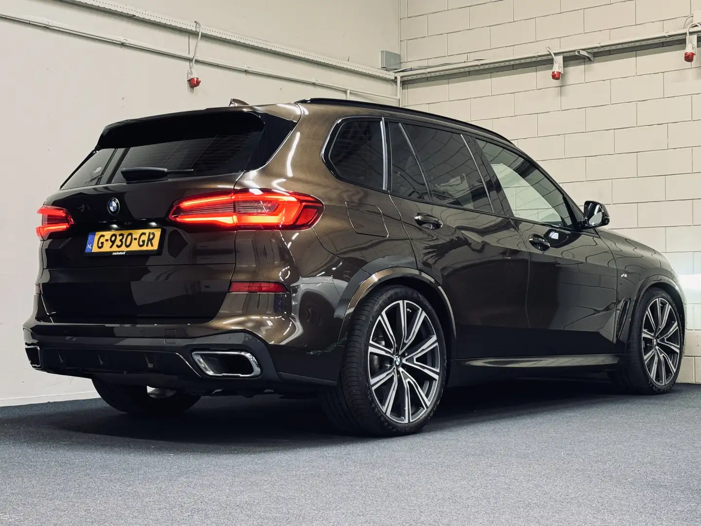 BMW X5 xDrive30d M-Sport | 22" | 4-wielst. | Panorama | L Bruin - 2