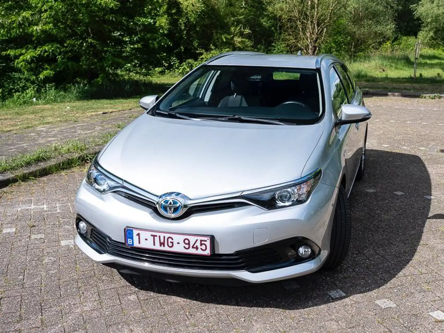 Toyota Auris Auris 1.8 Hybrid Automatik Touring Sports + winter Zilver - 1